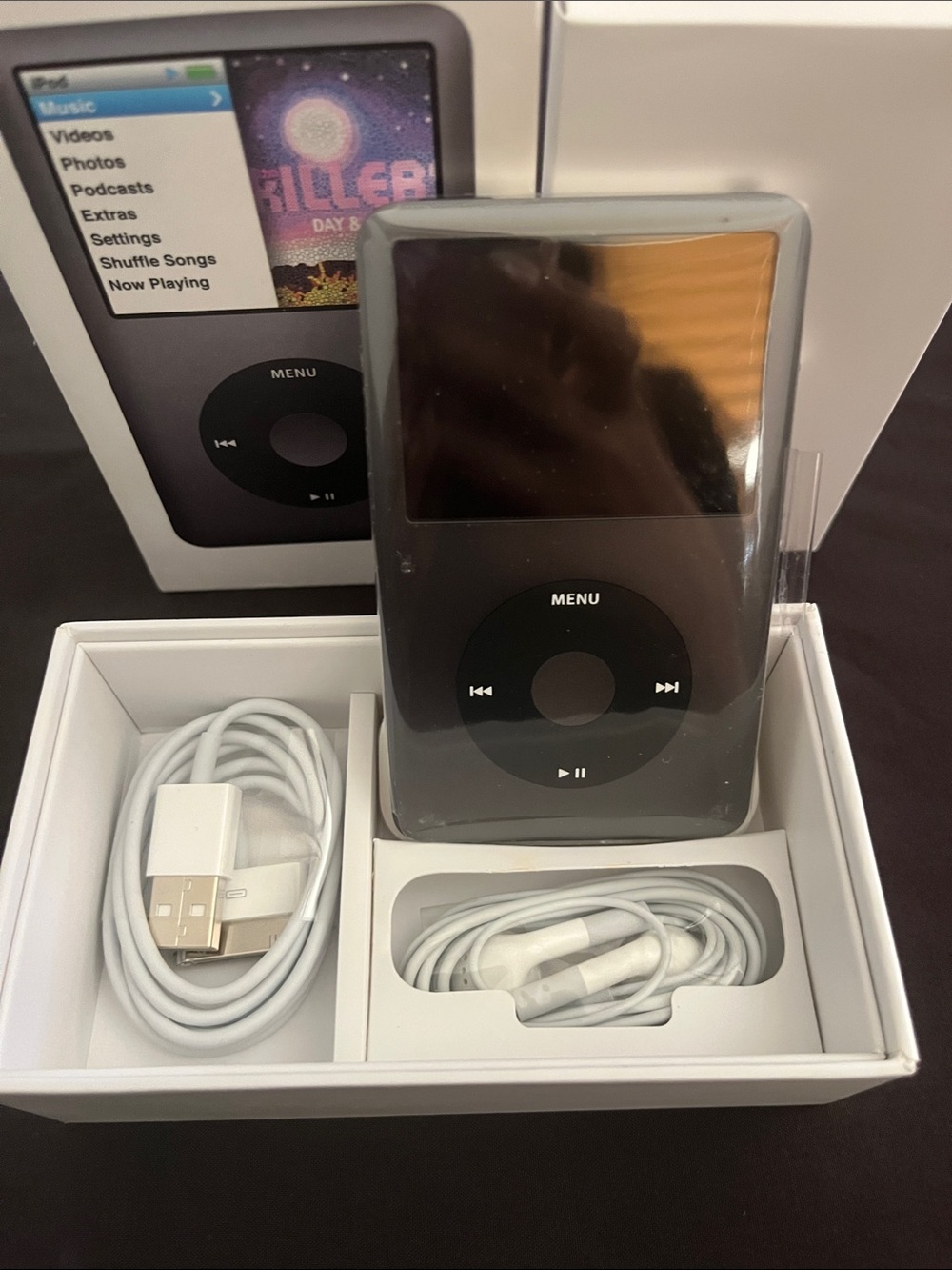 Apple iPod Classic Black 160gb charger and earbuds included. open box brand new